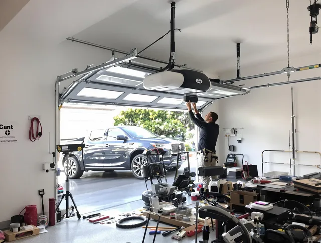 Dana Point Garage Door Repair specialist installing smart garage door opener system in Dana Point home