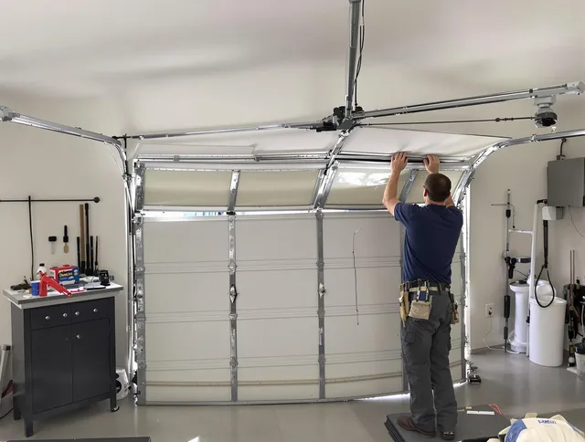 Dana Point Garage Door Repair specialist performing precise section replacement on Dana Point garage door