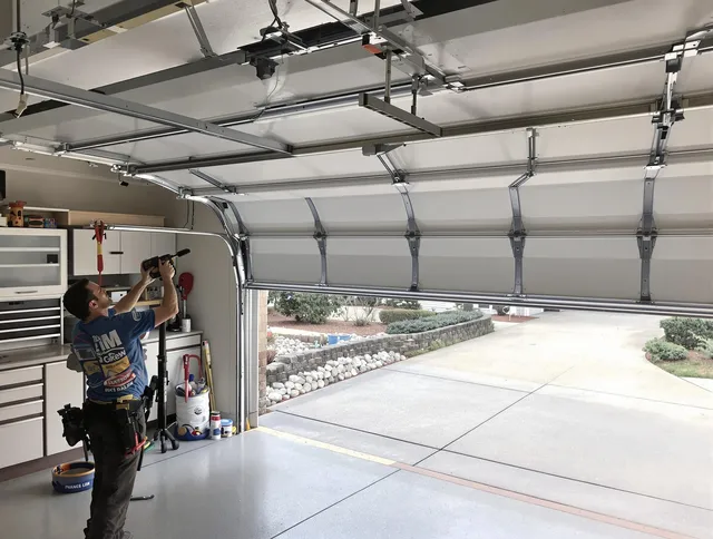 Garage door track repair service by Dana Point Garage Door Repair in Dana Point